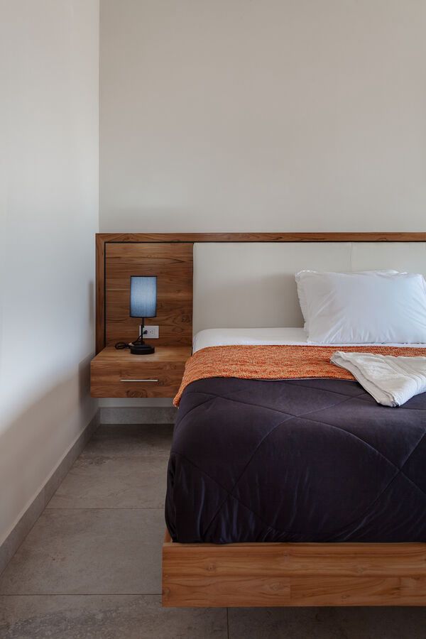 Bedroom with Teak Accents